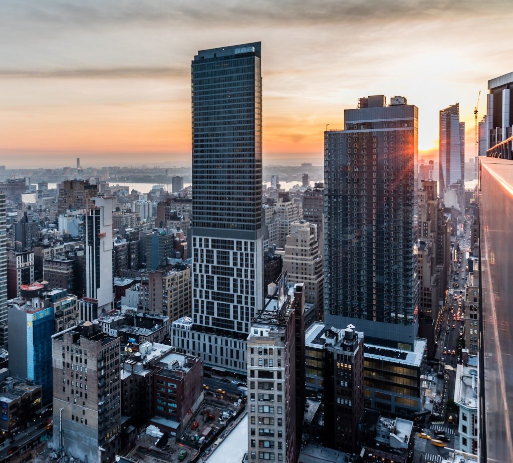 View of Eventi Hotel and the new Hudson Yards in Chelsea neighborhood in Manhattan at sunset.